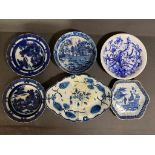 A collection of blue and white plates including a Caughley spoon tray