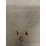 A beautiful 19th century 15 ct gold chain with 3 large Amethyst pendants set in 15ct gold