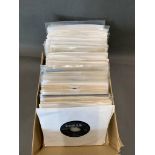 A box of 77 1950's singles