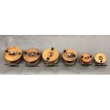 Wooden centre pin ''brass strap back'' reels made in walnut and mahogany. Total of 6 with