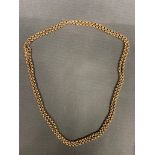 An extra long 9ct gold chain 32.6 grams