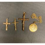 3 x 9 ct gold crucifixes and a St Christopher pendant on chain 7.1 grams