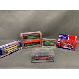 A small group of 4 Corgi boxed buses and 1 other