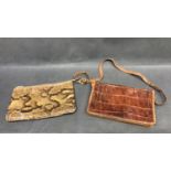A vintage crocodile skin hand bag with strap and a snakeskin clutch bag with zip fastener