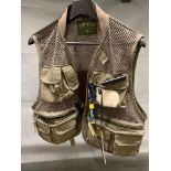 Orvis trout fishers vest, medium size filled with some tools etc, good cond.