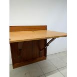 A Mid Century wall mounted folding desk by Mogens Koch