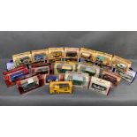A mixed collection of 24 die cast boxed model cars £15-£20