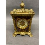 An antique carriage clock with tortoiseshell decoration made by the Great untitled clock Co.