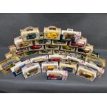 A collection of 30 boxed die cast model cars