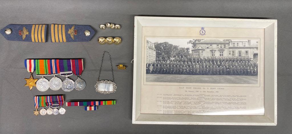 A group of WW2 service medals with miniatures Epaulettes buttons etc also photograph of Sqn Ldr