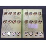 3 x sets of gold plated coins with one containing a half gram 24 ct gold coin