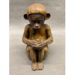An interesting ceramic figurine of a monkey