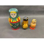 3 sets of Russian nesting doll’s graduating in size the largest 22cm high and the smallest 11 cm