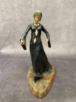 Porcelain figure of a lady on a marble base