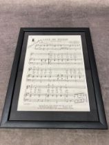 A framed singed song sheet of â€œ Love Me Tender â€œ by Elvis Presley Frame size 38 x 29cm