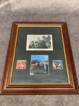 A framed signed photograph of the Rolling Stones including the late Brian Jones Frame size 32 x