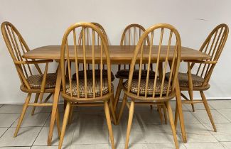 A mid century Ercol table and 6 dining chairs