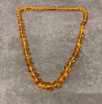 A vintage Amber necklace 73cm long