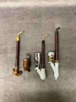 A collection of antique German porcelain pipes