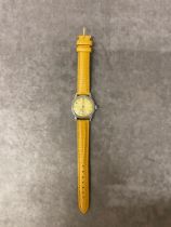 A 1942 PEREX watch with tan leather strap