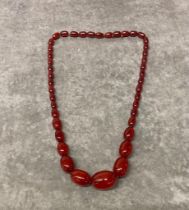 A vintage Cherry Amber necklace 66cm long