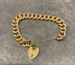 A ladies 9 carat gold bracelet with heart clasp 27.6