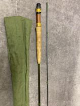A Carbon Rod Fly rod 9'0 2 piece carbon made by Renown Rods for Roy Owen in green rod sleeve. Up-