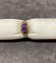 A 9 carat gold ladies ring set with Amethyst size N