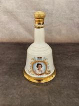 An unopened bottle Bells whiskey, produced to celebrate Queen Elizabeth’s 65th Birthday 1986.