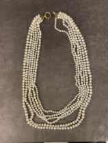 A large antique 6 strand pearl necklace joined with a large 9ct gold clasp £1000-£1500