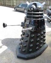 A full size Dr Who series black Dalek The black dalek moves very well the right arm goes out &