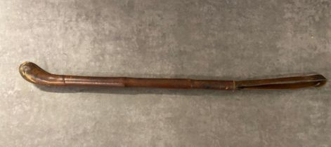 A 19th century leather cosh 63cm long