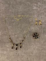 A good quality 9ct gold and garnet necklace, earrings and brooch set, weight 23.6 grams