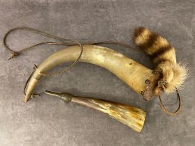 A pair of vintage powder horns