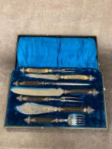 An antique plated silver meat carving set with antler handles