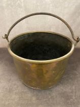 A large antique brass log bucket 45 cm wide x 30 cm high