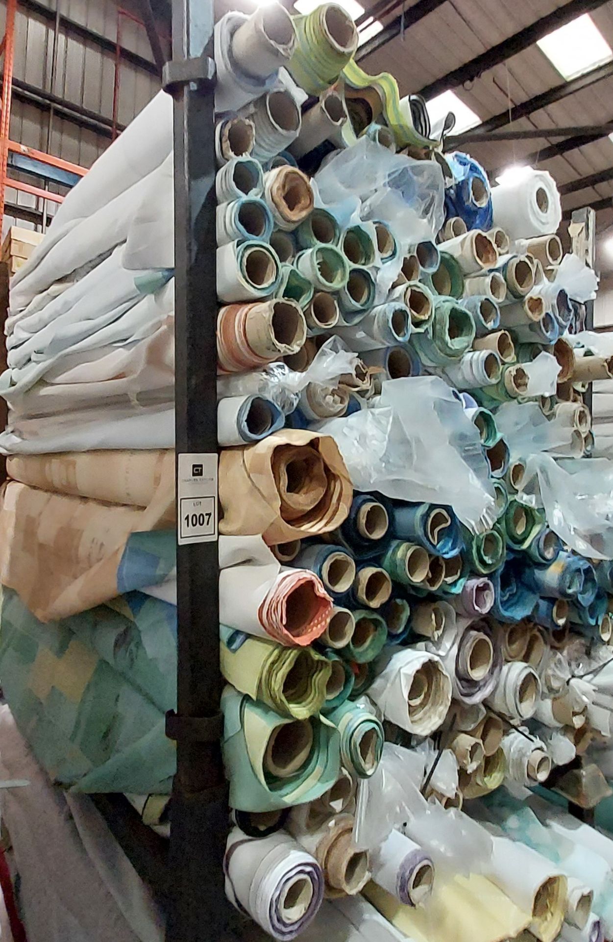 APPROX 150 PART ROLLS OF FABRICS IN ASSORTED COLOURS & DESIGNS (IN A FULL STILLAGE NOT INCLUDED)