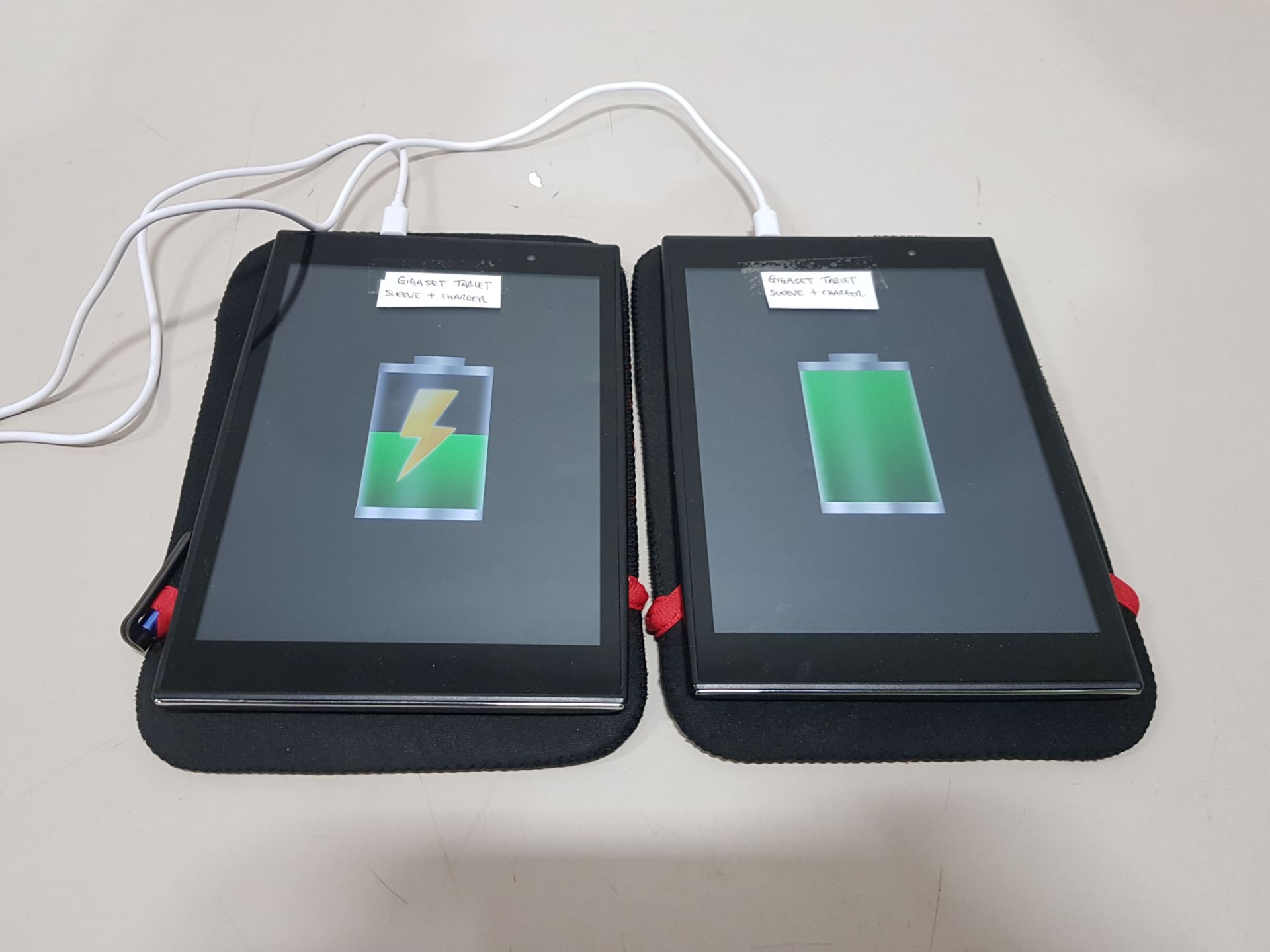 2 X GIGASET TABLET WITH CHARGER AND SLEEVE