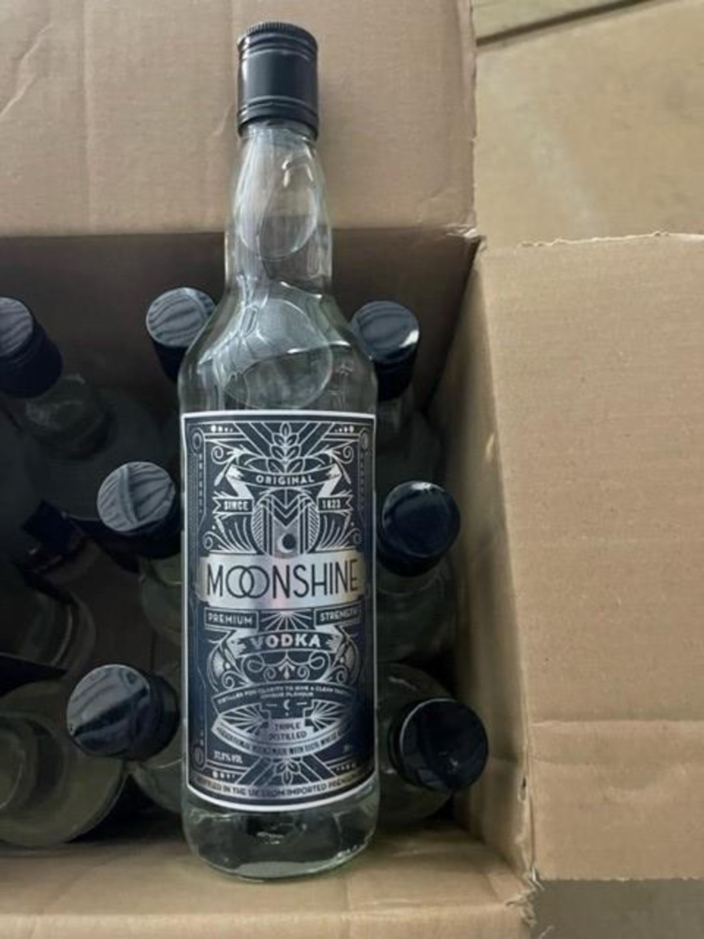 13 X BOTTLES OF ALCOHOL IE 12 X 70CL MOONSHINE VODKA AND 1 X RED WINE 2019 DOMAIN DES BOSENINS ***