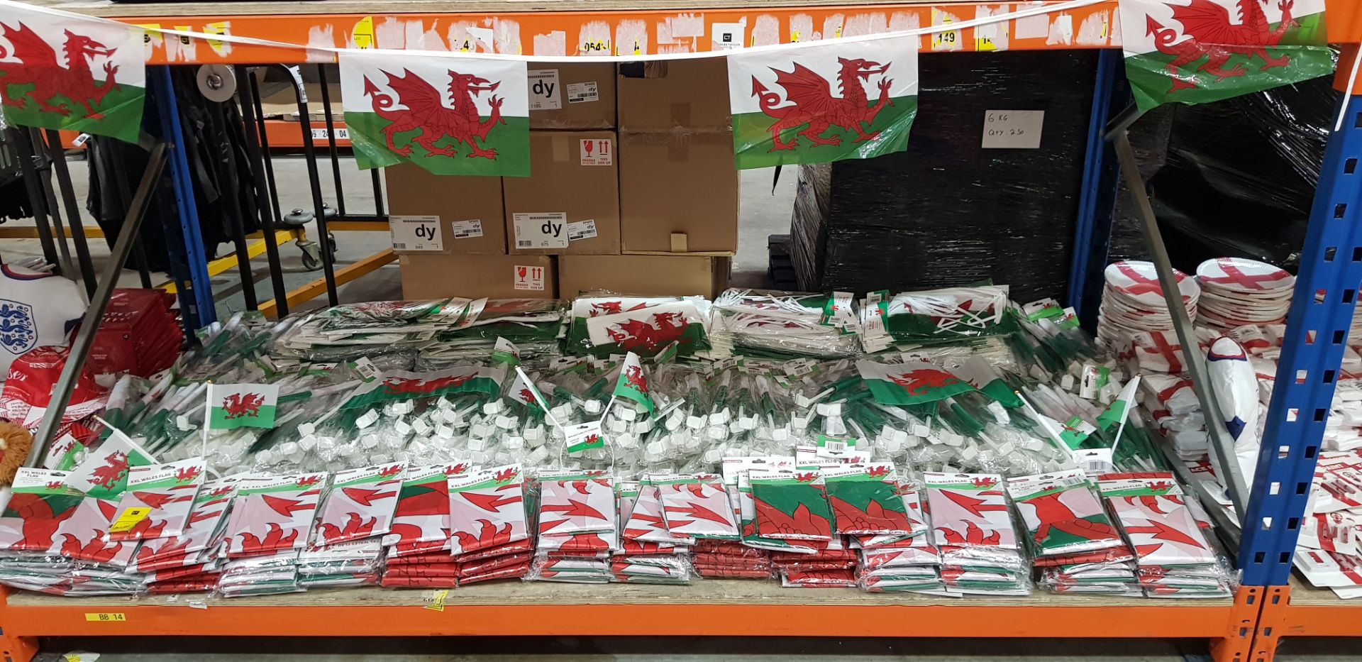 FULL BAY MXED BRAND NEW WALES LOT CONTAINING XXL WALES FLAGS 60X39 AND WALES CAR FLAGS
