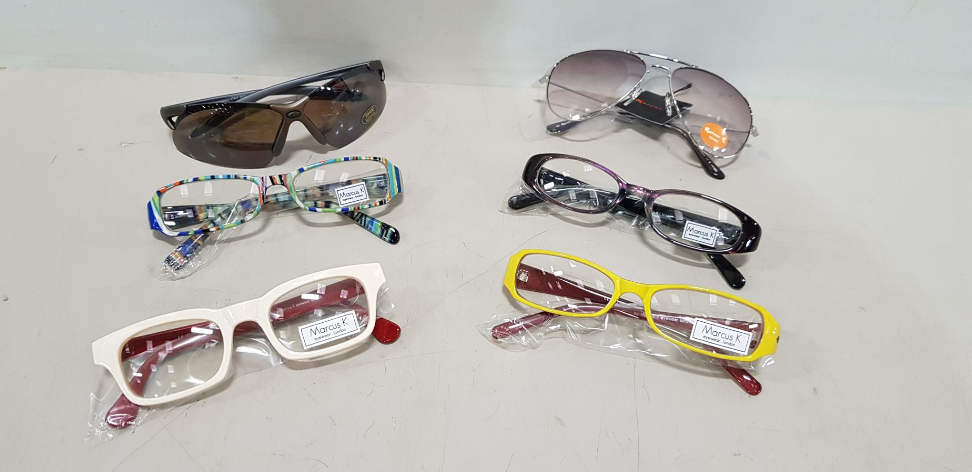 1900 PIECE LOT CONTAINING VARIOUS STYLES OF MARCUS K GLASSES WITH UV400 LENSES PROTETION , VARIOUS