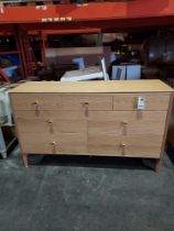 1 X 7 DRAWER CHEST OF DRAWERS IN LIGHT OAK 140 X 44 X 84CM (PLEASE NOTE CUSTOMER RETURNS AND BACK