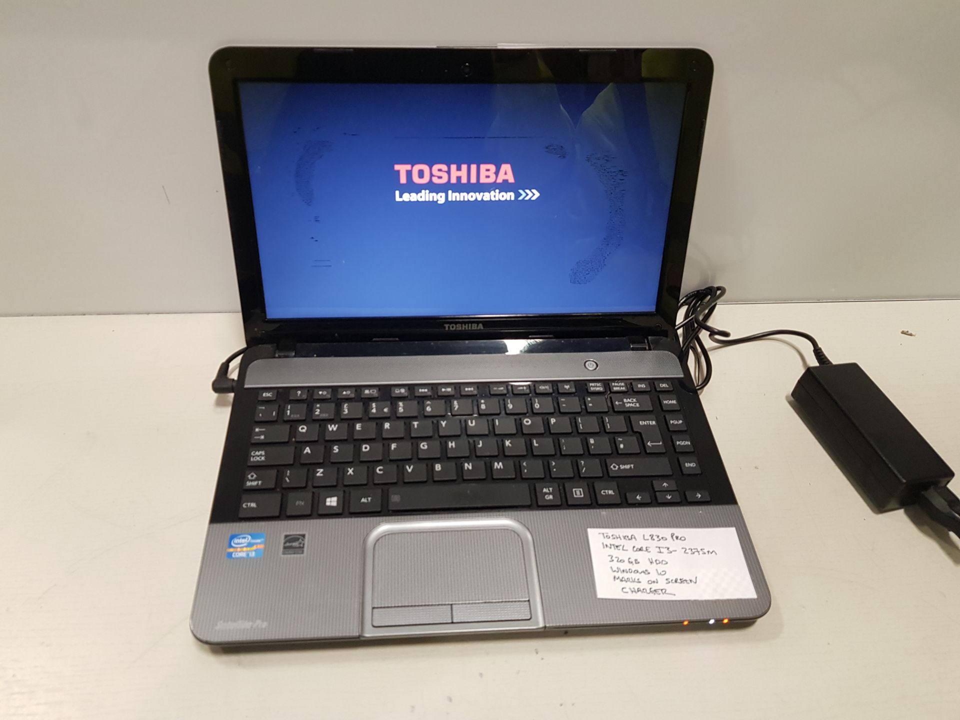 TOSHIBA L830 PRO INTEL CORE I3-2375M 320GB HDD WINDOWS 10 MARKS ON SCREEN , CHARGER