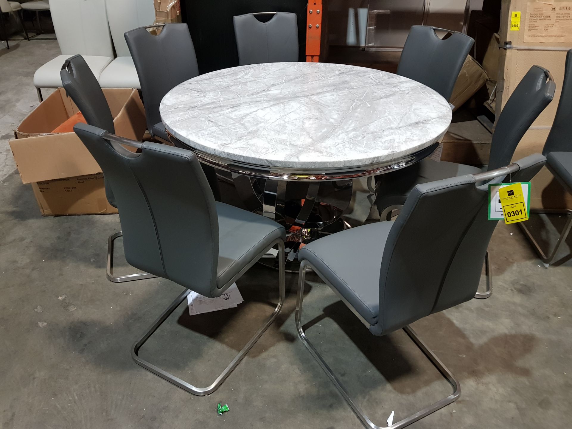 1 X GRANITE TOP ORACLE DINING TABLE 1300MM DIAMETER WITH 7 X LEATHER GREY DINING CHAIRS (PLEASE NOTE