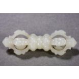 A Chinese Carved White Jade Vajra