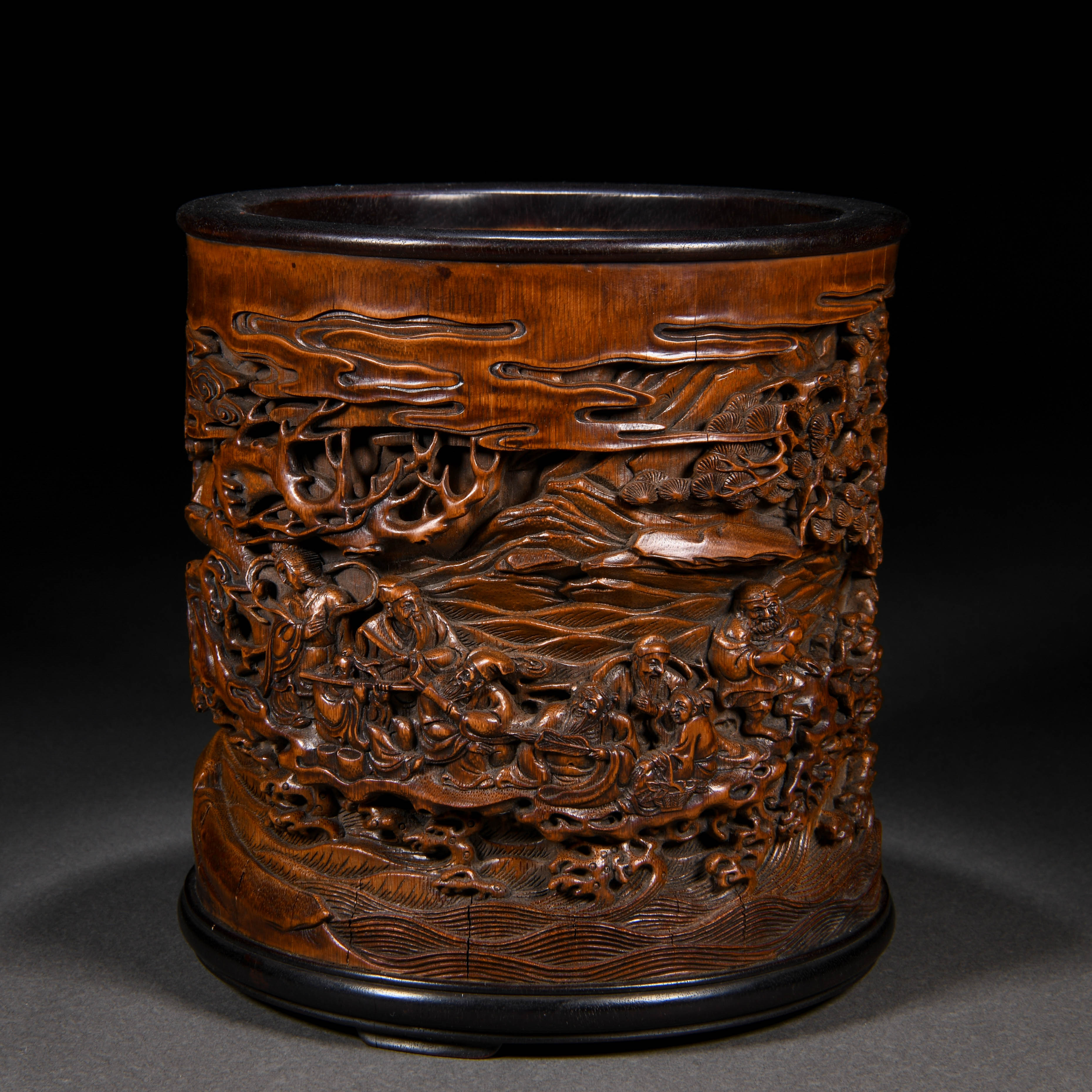 A Chinese Carved Bamboo Eight Immortals Brushpot