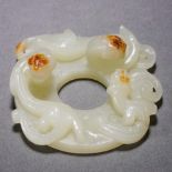 A Chinese Carved Jade Chilong Disk