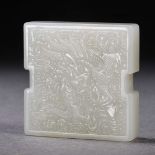 A Chinese Carved White Jade Dragon Plaque