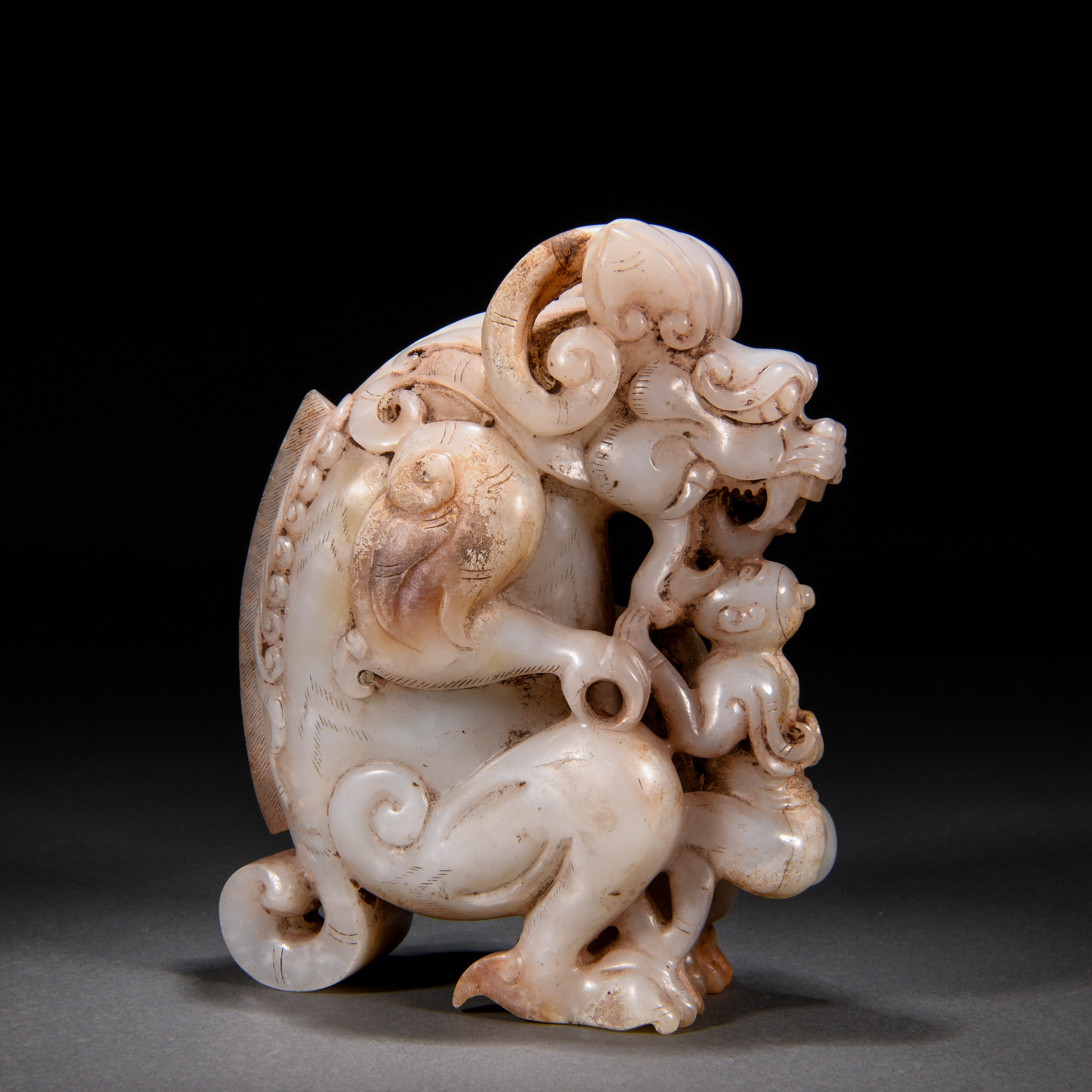 A Chinese Carved Archaic Jade Mythical Beast - Image 2 of 8