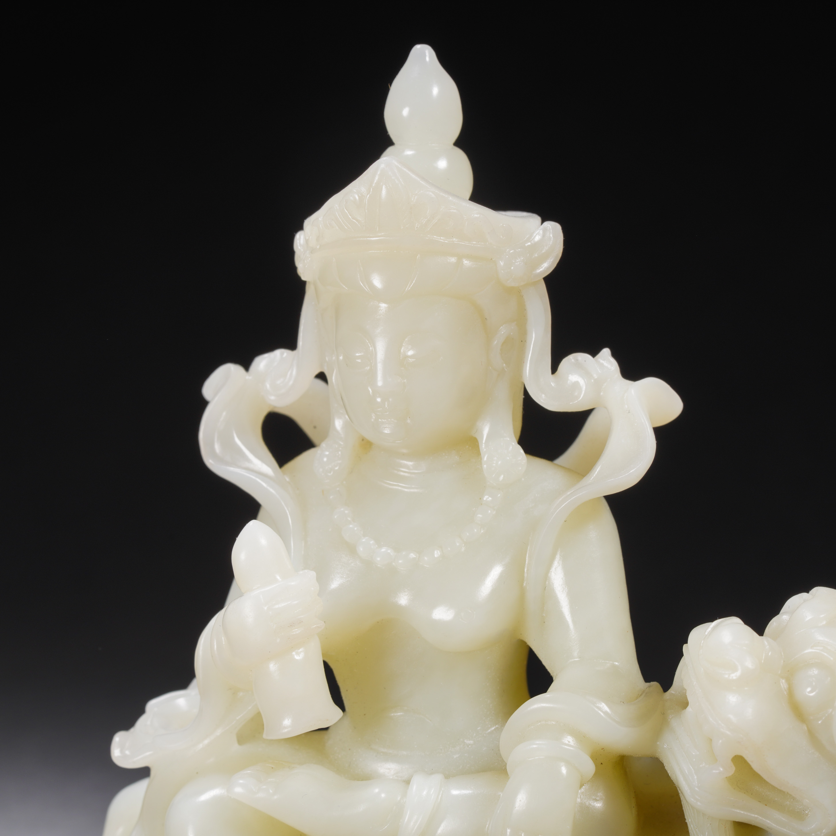 A Chinese Carved White Jade Bodhisattva with Lion - Image 2 of 13